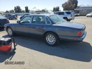 1998 Jaguar XJ with VIN SAJHX1247WC841374, listed as a Copart auction lot 51693595 with 109,509 mi miles and Clean Title. Bid and sale history available at DreamBid. Image 2.