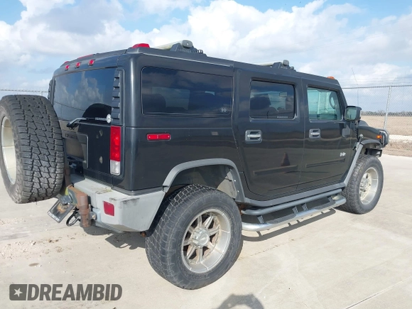 2006 Hummer H2 with VIN 5GRGN23U66H120601, listed as a IAAI auction lot 41524634 with 155,003 mi miles. Bid and sale history available at carsss.com. Image 4.