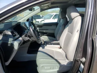 2019 Honda Odyssey EX-L with VIN 5FNRL6H77KB040597, listed as a Copart auction lot 53573445 with 110,024 mi miles and Salvage Title. Bid and sale history available at DreamBid. Image 7.