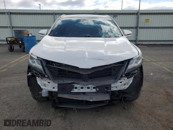 2015 Lincoln MKC z VIN 5LMTJ2AHXFUJ41226, wystawiony jako Copart lot #53430915 z przebiegiem 79 737 mil mil oraz Szkoda całkowita • Salvage title. Historia ofert i sprzedaży dostępna na DreamBid. Obrazek 5.