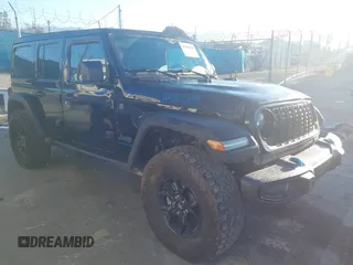 2024 Jeep Wrangler Willys z VIN 1C4RJXN6XRW215633, wystawiony jako IAAI lot #41861641 z przebiegiem 3 927 mil mil oraz . Historia ofert i sprzedaży dostępna na DreamBid. Obrazek 1.