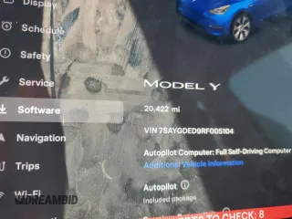2024 Tesla Model Y z VIN 7SAYGDED9RF005104, wystawiony jako Copart lot #64974545 z przebiegiem 20 422 mil mil oraz Szkoda całkowita • Salvage title. Historia ofert i sprzedaży dostępna na DreamBid. Obrazek 9.