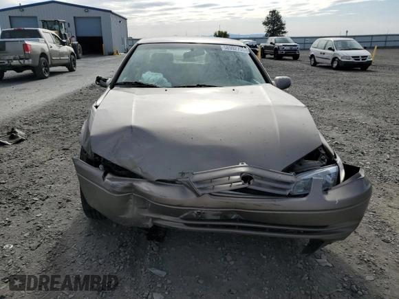 1999 Toyota Camry LE с VIN 4T1BG22K3XU536230, выставлен на аукционе Copart как лот 58992755 с пробегом Не указан миль и Списание • Salvage title. История ставок и продаж доступна на DreamBid. Изображение 5.