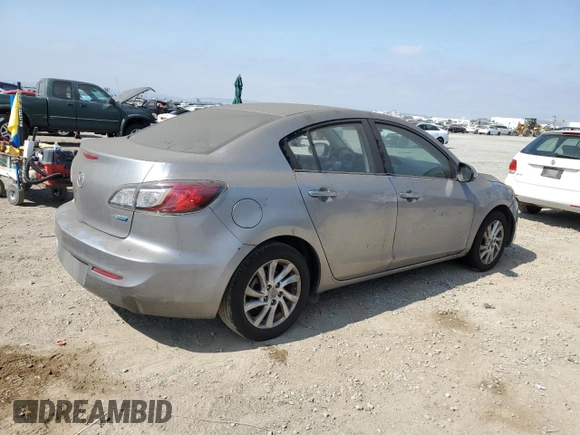2012 Mazda 3 i Touring with VIN JM1BL1V86C1557191, listed as a Copart auction lot 63002985 with 218,863 mi miles and Clean title. Bid and sale history available at DreamBid. Image 3.