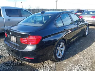 2015 BMW 3 Series 328i xDrive with VIN WBA3B3C57FF548161, listed as a IAAI auction lot 40383957 with 38,635 mi miles and . Bid and sale history available at DreamBid. Image 4.