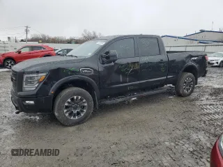 2022 Nissan Titan XD Platinum Reserve with VIN 1N6AA1FB2NN104867, listed as a Copart auction lot 81809934 with 17,574 mi miles and Salvage Title. Bid and sale history available at carsss.com. Image 1.