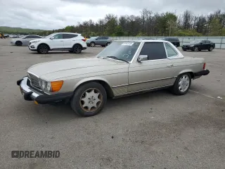 1985 Mercedes-Benz 380 z VIN WDBBA45C8FA035077, wystawiony jako Copart lot #57941015 z przebiegiem 127 403 mil mil oraz Tytuł czysty. Historia ofert i sprzedaży dostępna na DreamBid. Obrazek 1.