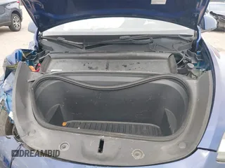2022 Tesla Model Y Long Range z VIN 7SAYGDEE9NA002493, wystawiony jako IAAI lot #41756460 z przebiegiem 68 315 mil mil oraz . Historia ofert i sprzedaży dostępna na DreamBid. Obrazek 10.
