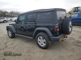 2023 Jeep Wrangler Sport S with VIN 1C4HJXDN1PW596242, listed as a Copart auction lot 82020314 with 30,061 mi miles and Salvage title. Bid and sale history available at DreamBid. Image 2.