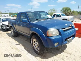 2001 Nissan Frontier SVE z VIN 1N6MD26Y51C342250, wystawiony jako IAAI lot #42158481 z przebiegiem 107 480 mil mil oraz . Historia ofert i sprzedaży dostępna na DreamBid. Obrazek 1.