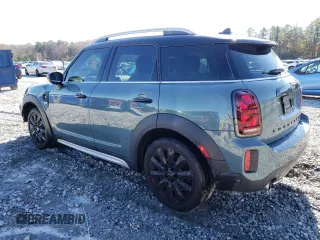 2021 MINI Countryman Cooper S with VIN WMZ53BR06M3M31586, listed as a Copart auction lot 84194484 with 70,141 mi miles and Salvage Title. Bid and sale history available at carsss.com. Image 2.