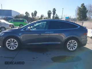 2016 Tesla Model X 70D with VIN 5YJXCBE24GF019450, listed as a IAAI auction lot 41517321 with 96,831 mi miles. Bid and sale history available at carsss.com. Image 14.