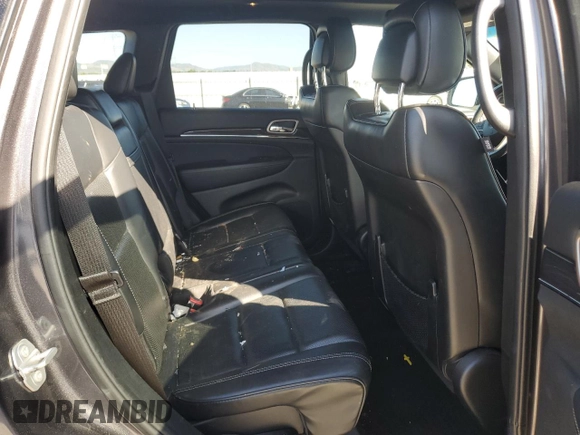 2017 Jeep Grand Cherokee Overland with VIN 1C4RJFCG9HC601806, listed as a Copart auction lot 61786275 with 122,898 mi miles and Salvage title. Bid and sale history available at DreamBid. Image 11.