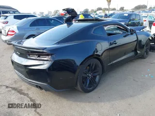 2018 Chevrolet Camaro 1LT z VIN 1G1FB1RS2J0124764, wystawiony jako IAAI lot #41428337 z przebiegiem 80 754 mil mil oraz . Historia ofert i sprzedaży dostępna na DreamBid. Obrazek 4.
