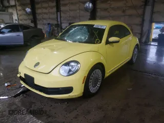 2014 Volkswagen Beetle 2.5L w/Sun with VIN 3VWJP7AT7EM605961, listed as a Copart auction lot 64607651 with 60,819 mi miles and Salvage Title. Bid and sale history available at DreamBid. Image 2.