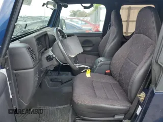2002 Jeep Wrangler Sport with VIN 1J4FA49S72P722606, listed as a Copart auction lot 72525484 with 104,391 mi miles and Salvage Title. Bid and sale history available at carsss.com. Image 7.