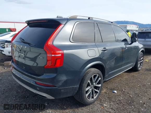 2016 Volvo XC90 T6 Momentum with VIN YV4A22PK0G1089068, listed as a IAAI auction lot 41819356 with 122,259 mi miles. Bid and sale history available at carsss.com. Image 4.