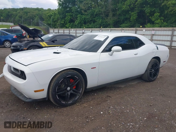 2012 Dodge Challenger R/T z VIN 2C3CDYBT2CH155385, wystawiony jako IAAI lot #42210312 z przebiegiem 111 892 mil mil oraz . Historia ofert i sprzedaży dostępna na DreamBid. Obrazek 17.