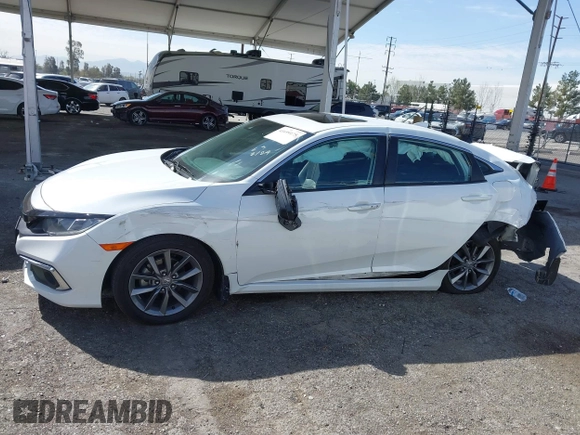 2020 Honda Civic EX-L with VIN 19XFC1F7XLE209835, listed as a IAAI auction lot 41699175 with 70,295 mi miles and . Bid and sale history available at DreamBid. Image 14.