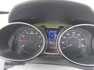 2012 Hyundai Veloster w/Gray Int z VIN KMHTC6AD7CU037130, wystawiony jako IAAI lot #41778588 z przebiegiem 125 549 mil mil oraz . Historia ofert i sprzedaży dostępna na DreamBid. Obrazek 7.