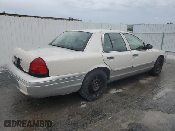 2011 Ford Police Interceptor with VIN 2FABP7BVXBX123711, listed as a Copart auction lot 46352595 with 151,597 mi miles and Clean title. Bid and sale history available at DreamBid. Image 3.