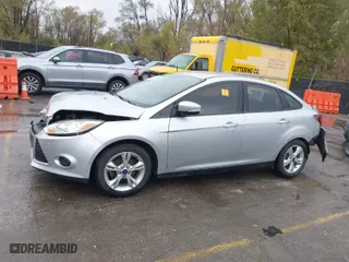 2014 Ford Focus SE with VIN 1FADP3F20EL406508, listed as a IAAI auction lot 40809098 with 89,731 mi miles. Bid and sale history available at carsss.com. Image 14.