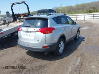 2014 Toyota RAV4 LE with VIN JTMBFREV7ED050667, listed as a IAAI auction lot 42082759 with 270,927 mi miles and . Bid and sale history available at DreamBid. Image 4.