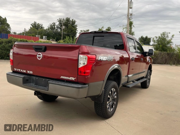 2016 Nissan Titan Pro-4X z VIN 1N6BA1F40GN516889, wystawiony jako Copart lot #72827234 z przebiegiem 123 706 mil mil oraz Czysty tytuł • Clean title. Historia ofert i sprzedaży dostępna na DreamBid. Obrazek 4.
