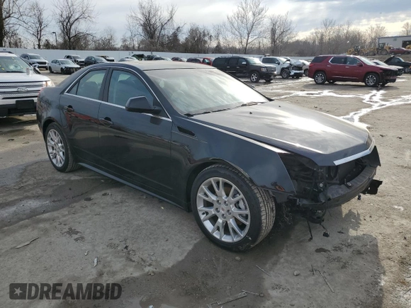 2012 Cadillac CTS Premium with VIN 1G6DS5E35C0142296, listed as a Copart auction lot 45970185 with 128,586 mi miles and Salvage Title. Bid and sale history available at DreamBid. Image 4.