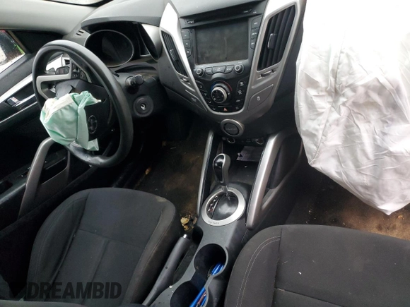 2014 Hyundai Veloster RE:FLEX z VIN KMHTC6AD2EU204268, wystawiony jako Copart lot #78651814 z przebiegiem Nie podano mil oraz Szkoda całkowita • Salvage title. Historia ofert i sprzedaży dostępna na DreamBid. Obrazek 8.