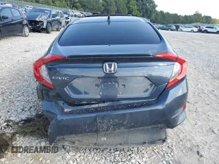2020 Honda Civic Sedan EX-L with VIN 19XFC1F7XLE021851, listed as a Copart auction lot 68318734 with 74,519 mi miles and Salvage Title. Bid and sale history available at carsss.com. Image 6.