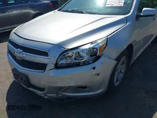 2013 Chevrolet Malibu LT with VIN 1G11C5SA2DF352362, listed as a IAAI auction lot 41955763 with 122,328 mi miles and . Bid and sale history available at DreamBid. Image 6.