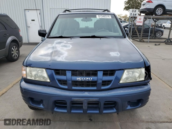 2003 Isuzu Rodeo z VIN 4S2DM58W234305979, wystawiony jako Copart lot #81346314 z przebiegiem 177 272 mil mil oraz Szkody całkowita. Historia ofert i sprzedaży dostępna na DreamBid. Obrazek 5.
