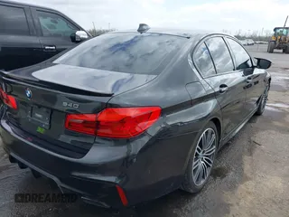 2017 BMW 5 Series 540i with VIN WBAJE5C35HG916844, listed as a IAAI auction lot 41793043 with 92,964 mi miles and . Bid and sale history available at carsss.com. Image 4.