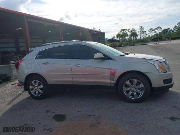 2014 Cadillac SRX Luxury Collection with VIN 3GYFNBE34ES566697, listed as a IAAI auction lot 41690934 with 85,757 mi miles. Bid and sale history available at carsss.com. Image 13.