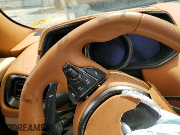 2022 Aston Martin DB11 z VIN SCFRMFCW6NGM11398, wystawiony jako Copart lot #53825715 z przebiegiem Nie podano mil oraz Szkoda całkowita • Salvage title. Historia ofert i sprzedaży dostępna na DreamBid. Obrazek 9.