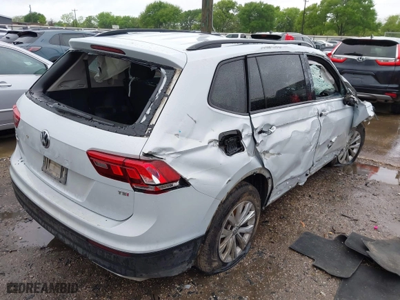 2018 Volkswagen Tiguan S with VIN 3VV1B7AX2JM120062, listed as a IAAI auction lot 41904852 with 166,909 mi miles. Bid and sale history available at carsss.com. Image 4.
