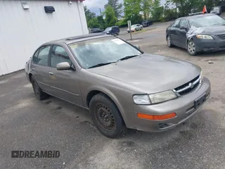 1999 Nissan Maxima GXE z VIN JN1CA21D5XT203484, wystawiony jako IAAI lot #42161696 z przebiegiem 249 747 mil mil oraz . Historia ofert i sprzedaży dostępna na DreamBid. Obrazek 1.