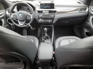 2016 BMW X1 xDrive28i z VIN WBXHT3C30GP883538, wystawiony jako Copart lot #46283315 z przebiegiem 70 696 mil mil oraz Szkoda całkowita • Salvage title. Historia ofert i sprzedaży dostępna na DreamBid. Obrazek 8.