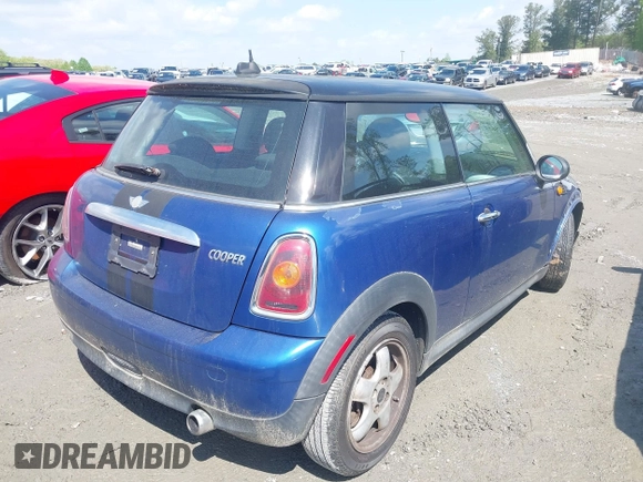 2008 MINI Hardtop with VIN WMWMF33538TU67798, listed as a IAAI auction lot 41978652 with 184,218 mi miles and . Bid and sale history available at DreamBid. Image 4.
