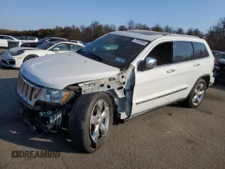 2013 Jeep Grand Cherokee Overland with VIN 1C4RJFCG8DC639408, listed as a Copart auction lot 77910444 with 89,623 mi miles and Salvage Title. Bid and sale history available at carsss.com. Image 1.