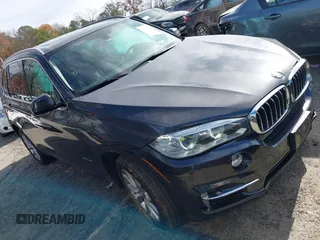 2014 BMW X5 sDrive35i with VIN 5UXKR2C56E0H32059, listed as a IAAI auction lot 41096908 with 124,322 mi miles. Bid and sale history available at carsss.com. Image 1.