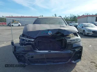 2022 BMW X7 M50i z VIN 5UXCX6C08N9M15818, wystawiony jako IAAI lot #41434065 z przebiegiem 52 740 mil mil oraz . Historia ofert i sprzedaży dostępna na DreamBid. Obrazek 6.