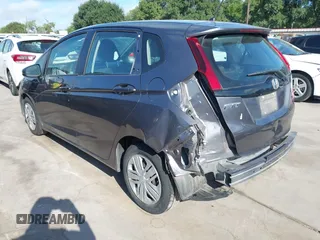2020 Honda Fit LX with VIN 3HGGK5H46LM725764, listed as a IAAI auction lot 42499144 with 79,758 mi miles and . Bid and sale history available at DreamBid. Image 3.