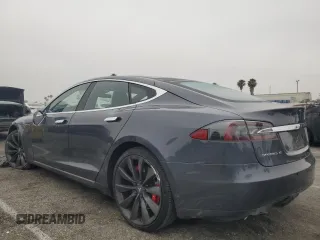 2014 Tesla Model S 60 with VIN 5YJSA1H10EFP60690, listed as a Copart auction lot 62515065 with 57,864 mi miles and Clean title. Bid and sale history available at DreamBid. Image 2.