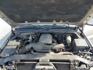 2004 Chevrolet Suburban LT z VIN 1GNEC16Z34J242670, wystawiony jako Copart lot #60987725 z przebiegiem 277 961 mil mil oraz Szkoda całkowita • Salvage title. Historia ofert i sprzedaży dostępna na DreamBid. Obrazek 12.