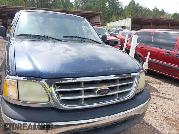 2003 Ford F-150 XL with VIN 1FTRX18L63NB59927, listed as a IAAI auction lot 41842559 with 1 mi miles. Bid and sale history available at carsss.com. Image 6.