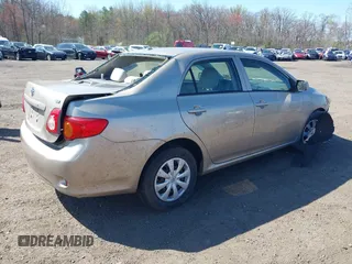 2009 Toyota Corolla with VIN 1NXBU40E09Z144942, listed as a IAAI auction lot 42051178 with 101,564 mi miles and . Bid and sale history available at DreamBid. Image 4.