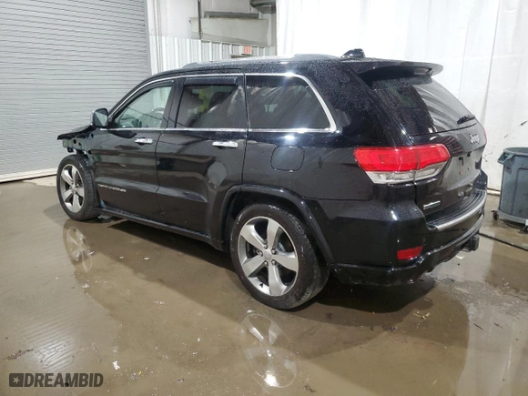 2014 Jeep Grand Cherokee Overland with VIN 1C4RJFCM2EC298661, listed as a Copart auction lot 81331004 with 245,716 mi miles and Salvage Title. Bid and sale history available at carsss.com. Image 2.