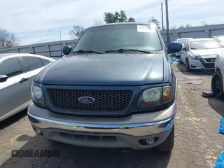 2003 Ford F-150 XLT with VIN 1FTRW08L33KB05743, listed as a IAAI auction lot 41828979 with 117,345 mi miles. Bid and sale history available at carsss.com. Image 12.